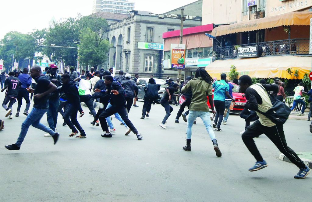 Protesters fleeing from  